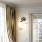YANSUN 1-Light Modern Black Wall Sconce, E26 Socket Decorative Indoor Wall Light, Minimalist Globe-Shaped Fixture