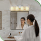 YANSUN 24 in. 4-Light Nickel Bathroom Vanity Light with Cylinder Frosted Glass Shade for Powder Room or Dressing Room
