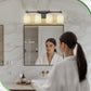 YANSUN 24 in. 4-Light Black and Gold Bathroom Vanity Light with Cylinder Frosted Glass Shade for Vanity or Dressing Room