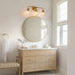24 in. 3-Light Mid-Century Modern Globe Bathroom Vanity Light, Brass Gold Round Wall Fixture with Clear Glass Shades