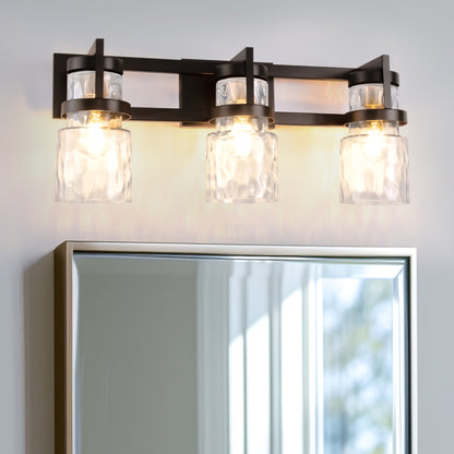 23 in. 3-Light Black and Gold Industrial Cylinder Vanity Light for Bathroom Mirror with Water Glass Shades