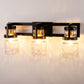 23 in. 3-Light Black and Gold Industrial Cylinder Vanity Light for Bathroom Mirror with Water Glass Shades