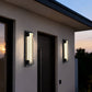 YANSUN Outdoor Wall Light with Wavy Glass Panel, Integrated LED 2700K Warm White, Sand Black Finish, 18.9-Inch Length