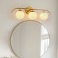 24 in. 3-Light Brass Vanity Light Fixture with Frosted Glass Globes Modern Wall Sconce for Bathroom, Mirror, and Hallway