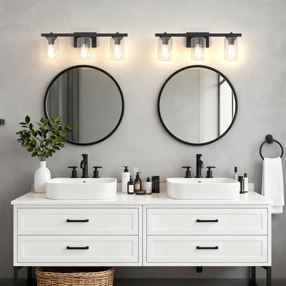YANSUN 24 in. 3-Light Black Metal Vanity Wall Light with Curved Clear Glass Cylinder Shades