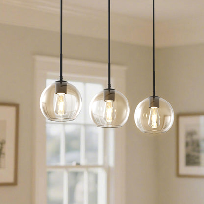 YANSUN 3-Light Island Pendant with Clear Glass Globes, Industrial Matte Black Finish for Kitchen & Dining (7.9"x5.1")