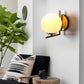 YANSUN 6.7 in. 1-Light Modern Indoor Wall Sconce in Brass Finish with Globe Shade, E26 Base, for Bedroom, Living Room, Hallway