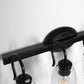 25.2 in. 4-Light Matte Black Modern Bathroom Vanity Light Mirror Wall Light with Black Accents and Seeded Glass Shade