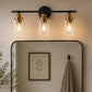 YANSUN 3-Light Black Gold Bathroom Vanity Light with Round Glass Shades Modern Wall Fixture