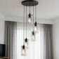 YANSUN 5-Light Modern Matte Black Pendant Light with Clear Glass Shade Traditional E26 Ceiling Light Fixture for Kitchen