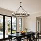 YANSUN 53" Farmhouse Wagon Wheel Chandelier, 28-Light Matte Black Ceiling Light, Adjustable Height, E26 Bulbs, Dining Room Fixture